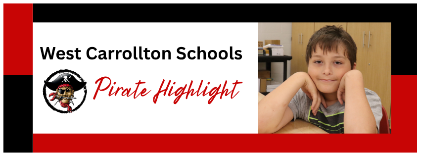 A smiling boy sits at a desk with hands on his cheeks. Behind him, a red and white banner displays "West Carrollton Schools Pirate Highlight".