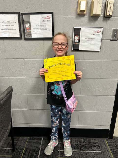 Adrianna receiving January student of the month award