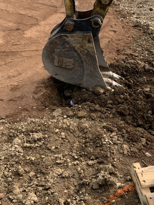 Baseball being buried in dirt