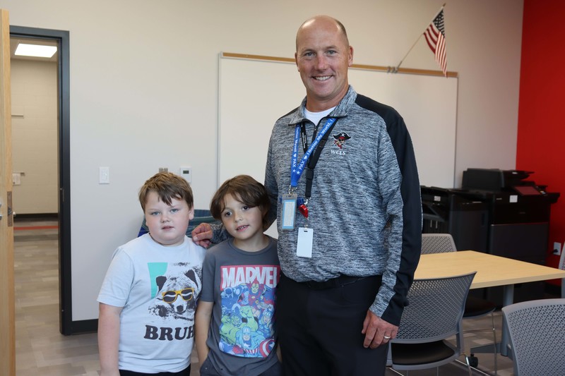 School Principal with 2 Students