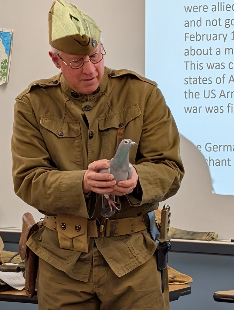 Man dressed in WWI military uniform.