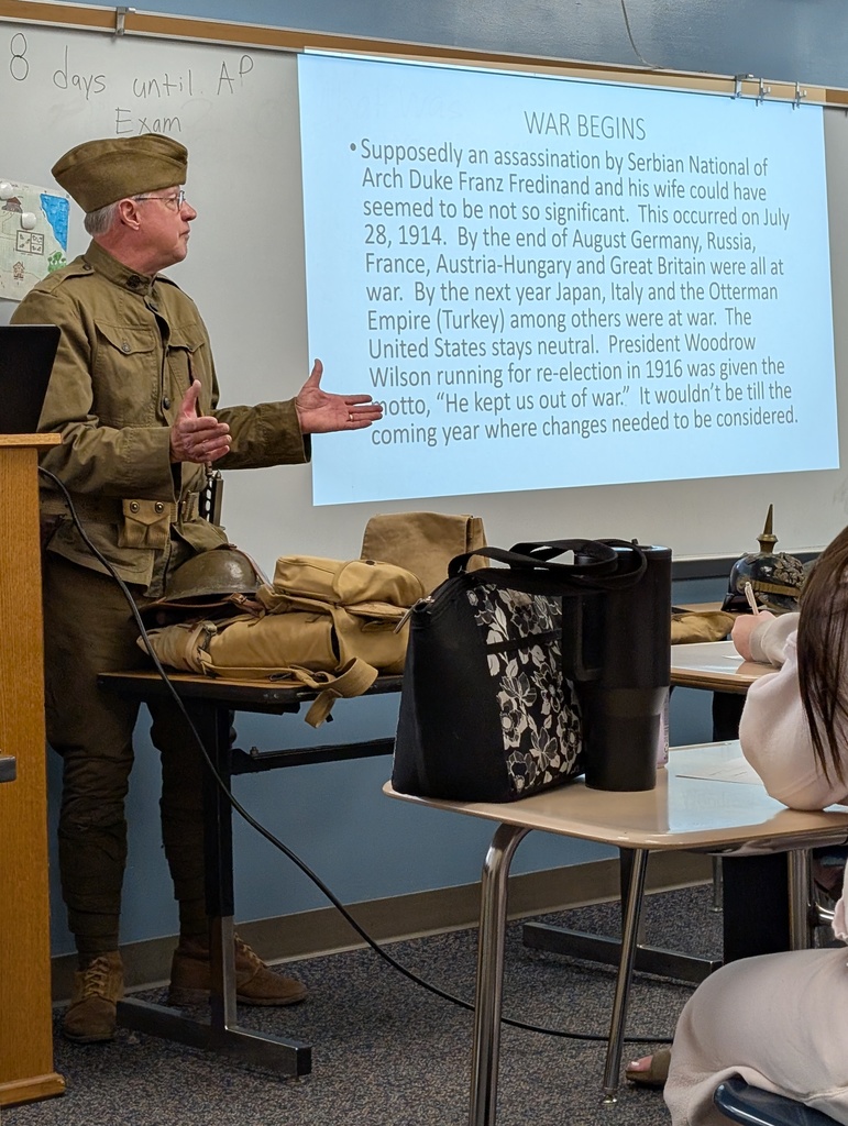 Man dressed in WWI military uniform.