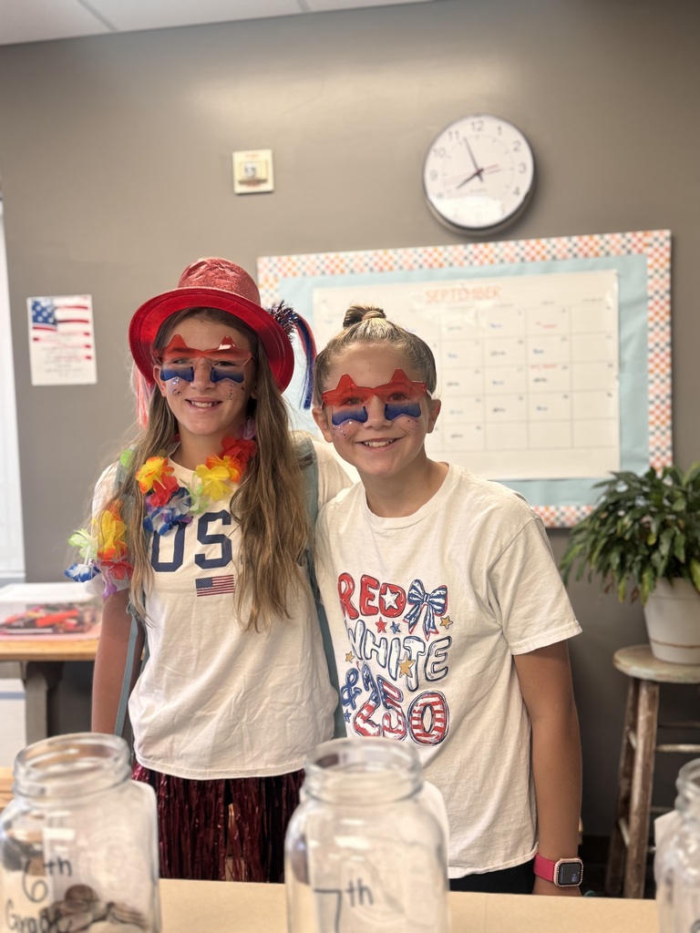 6th Graders, Brooke B and Kenzi M, showing off their homecoming their homecoming spirit!