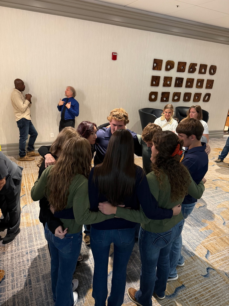 students huddling 