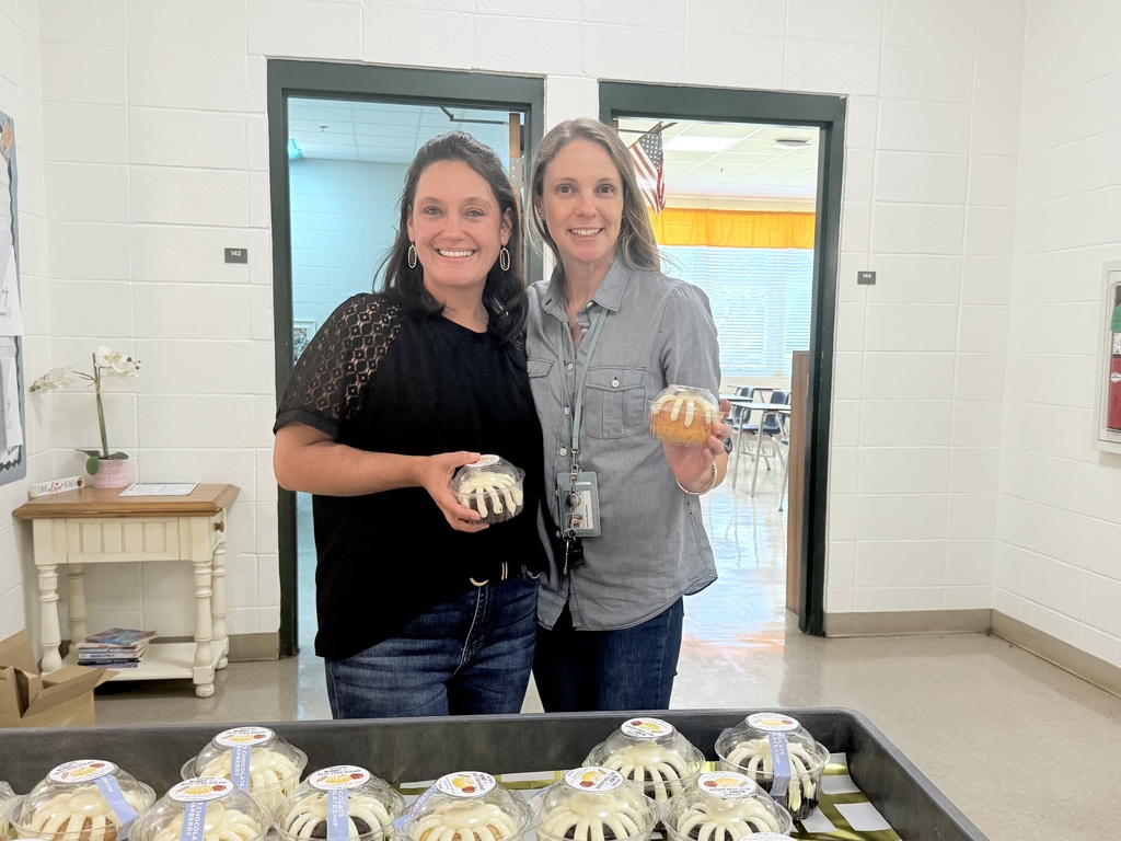 Teachers enjoy cake compliments of The GaP!