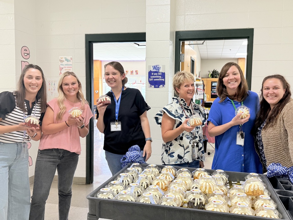 Teachers enjoy cake compliments of The GaP!