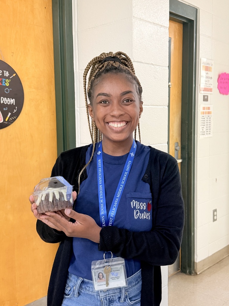 Teacher enjoys cake compliments of The GaP!