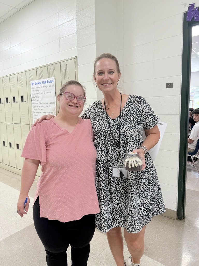 Teachers enjoy cake compliments of The GaP!