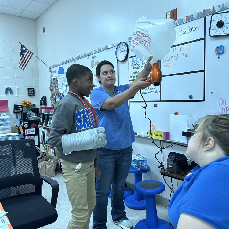 Ms. Boudreaux’s students conduct an experiment  