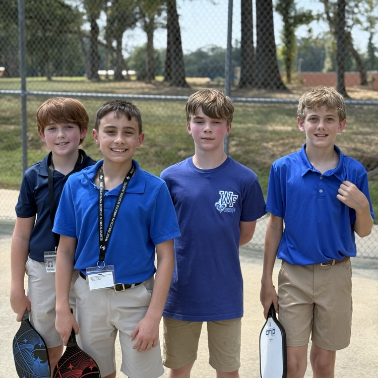 Students play pickleball. 