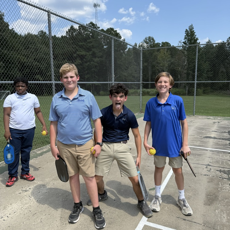 Students play pickleball. 