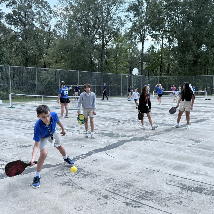 Students play pickleball. 