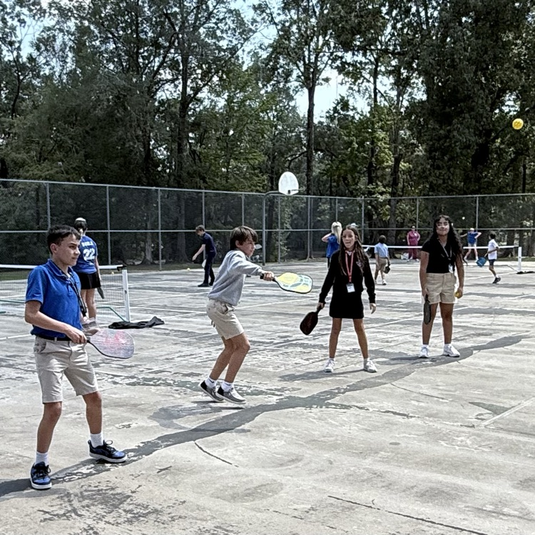 Students play pickleball. 