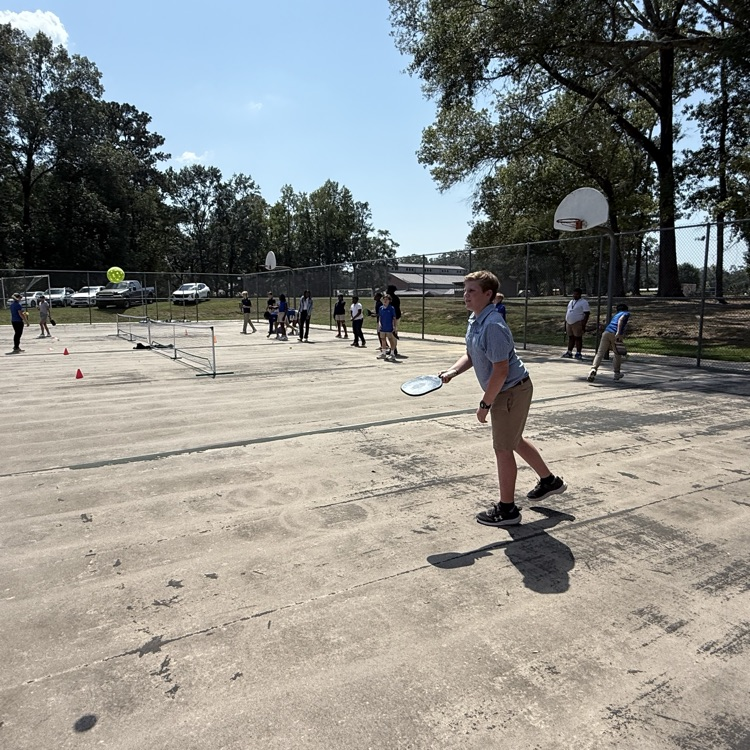 Students play pickleball. 
