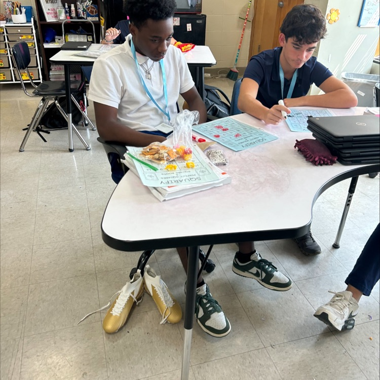 Students celebrate square day.
