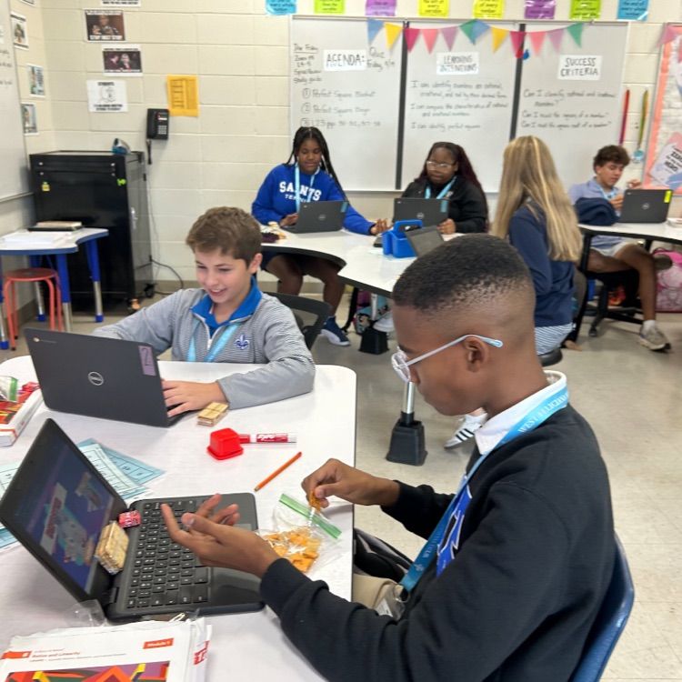 Students celebrate square day.