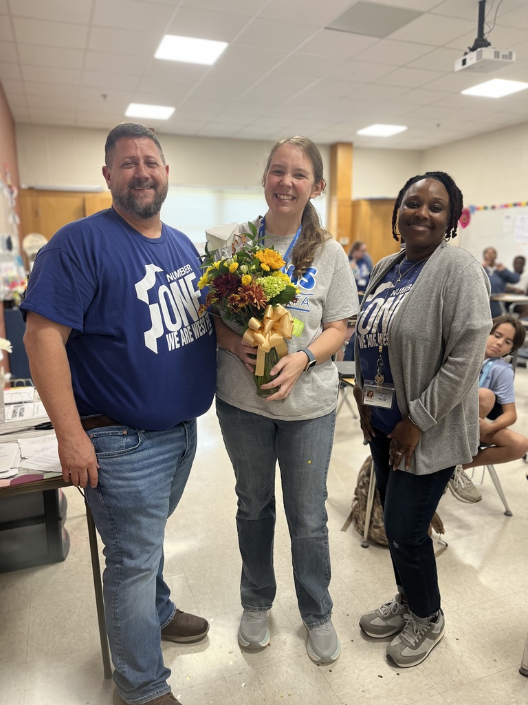 Ms. Christman pictured with Mr. Lester & Ms. Vessel.