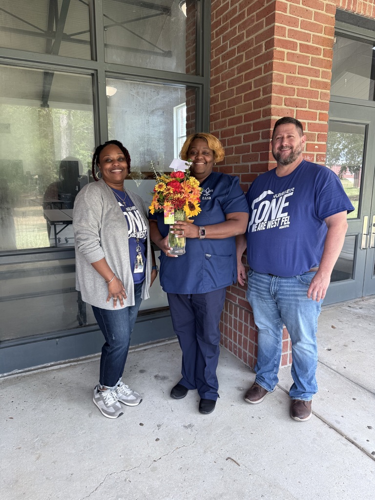 Ms. Liza pictured with Ms. Vessel and Mr. Lester.