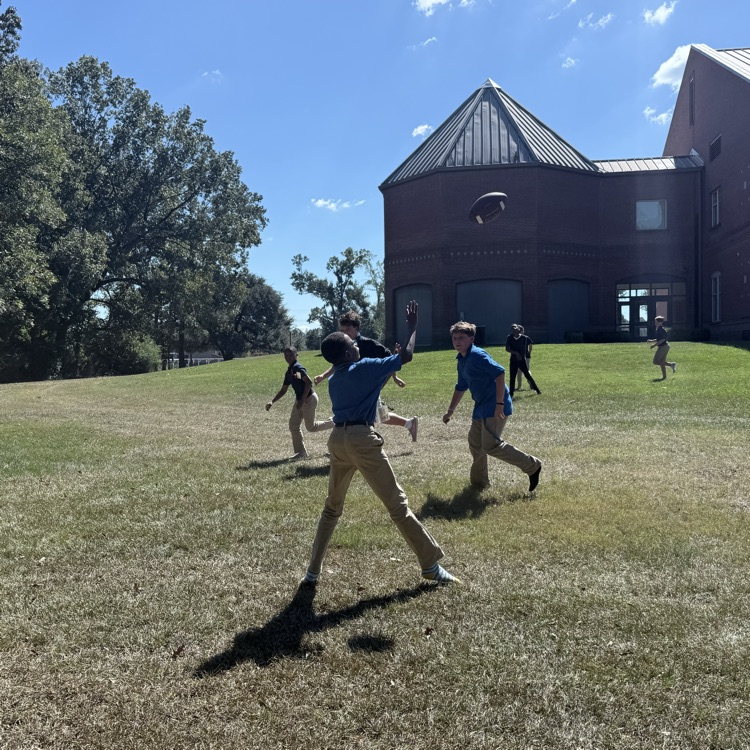 Students play football during Club Day