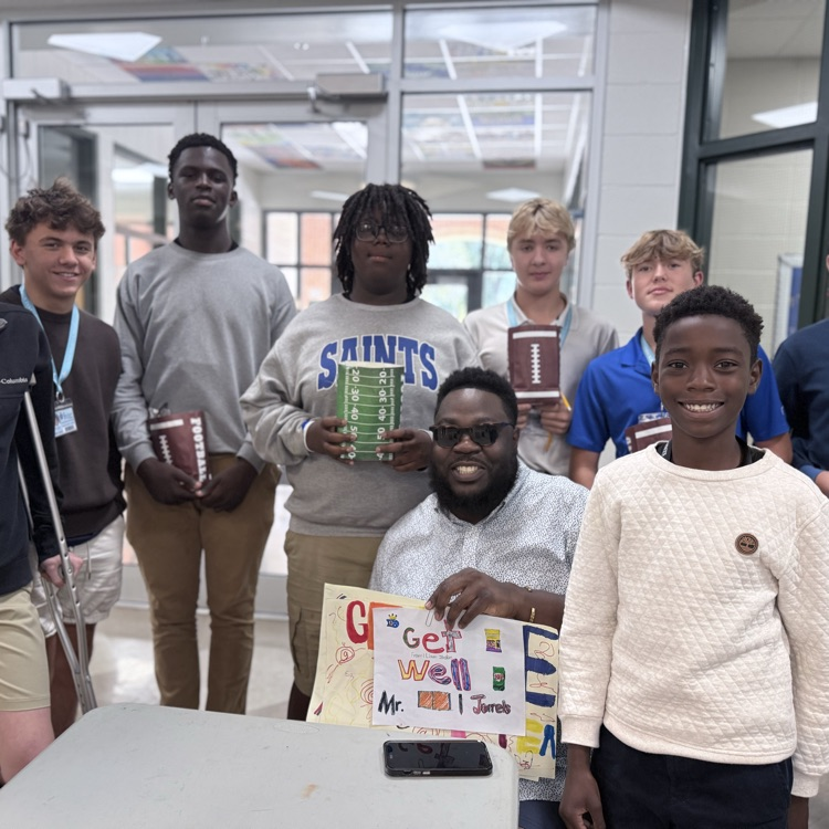 Mr. Jarrels pictured with students. 