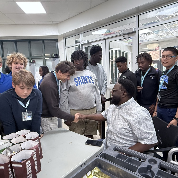 Mr. Jarrels pictured with students. 