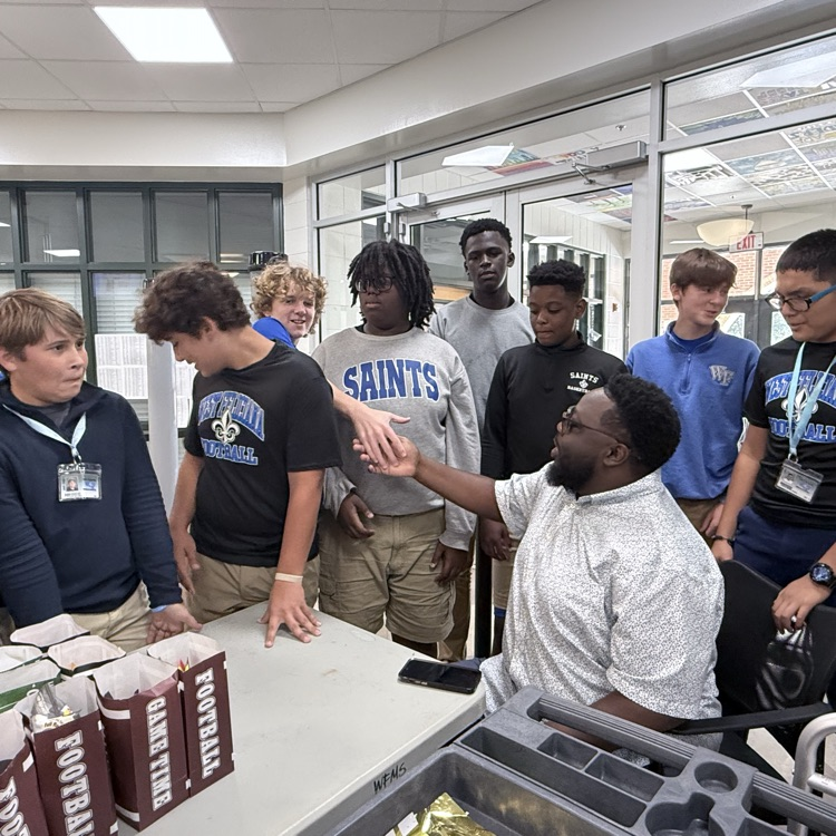 Mr. Jarrels pictured with students. 