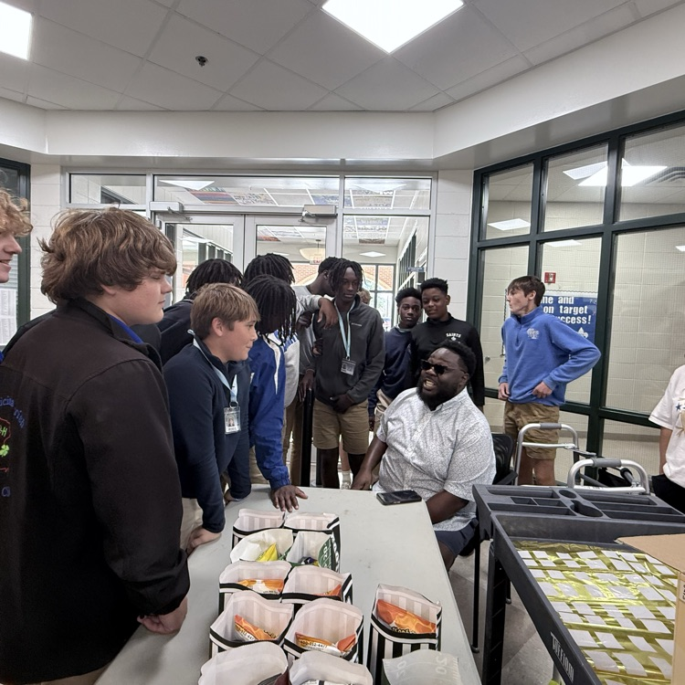 Mr. Jarrels pictured with students. 