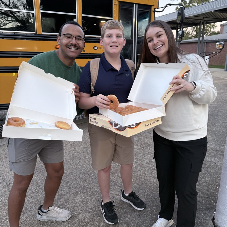 WyldLife sponsors give out donuts. 
