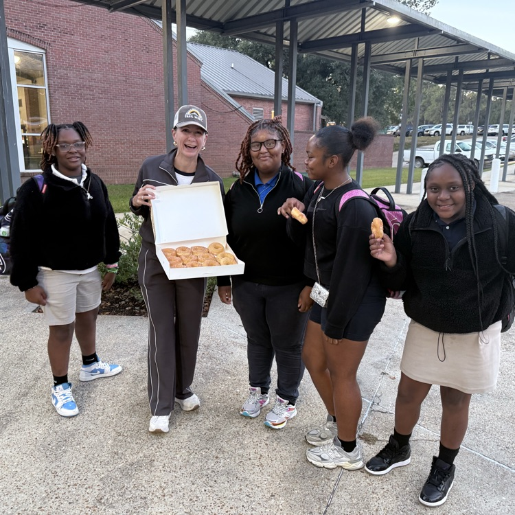 WyldLife sponsors give out donuts. 