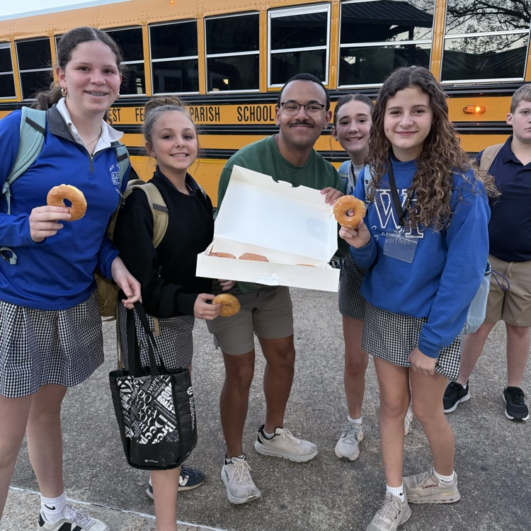 WyldLife sponsors give out donuts. 