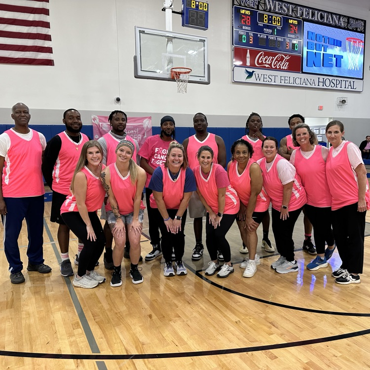 Middle School Faculty team pictured on court  