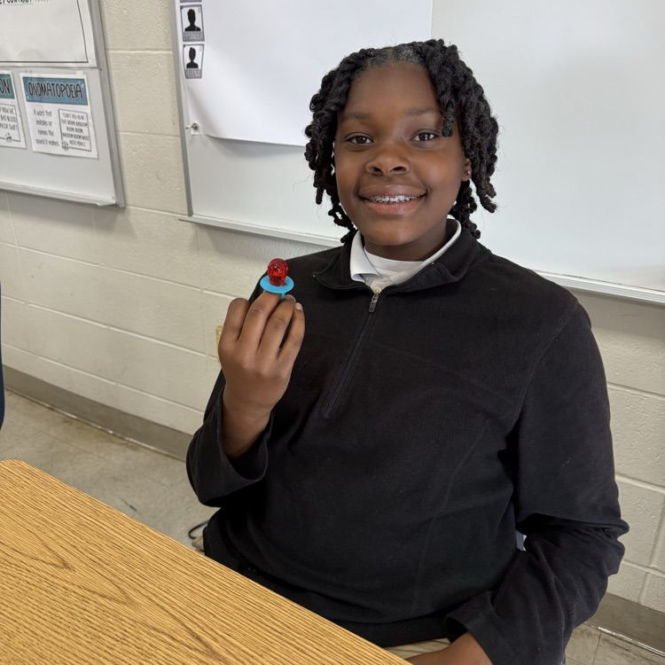 Student shows off ring pops