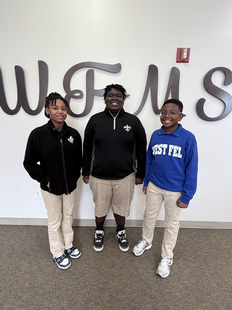 November students of the month pose for a photo.
