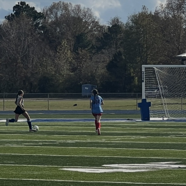 Soccer player with ball 
