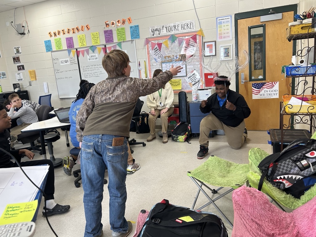 Student "hooks" fellow student by the antlers.