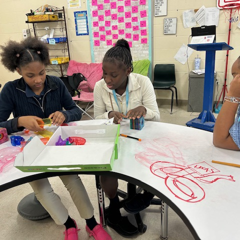 Students create marble run puzzles  