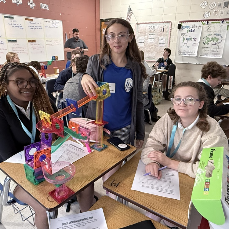 Students create marble run puzzles. 