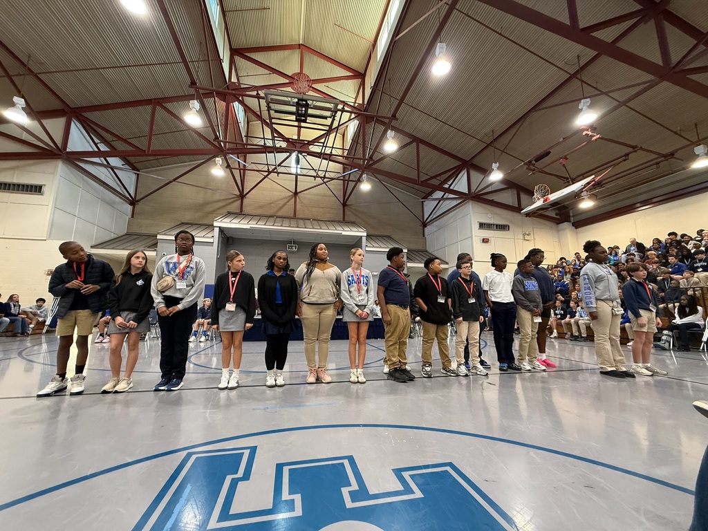 Students stand to be recognized