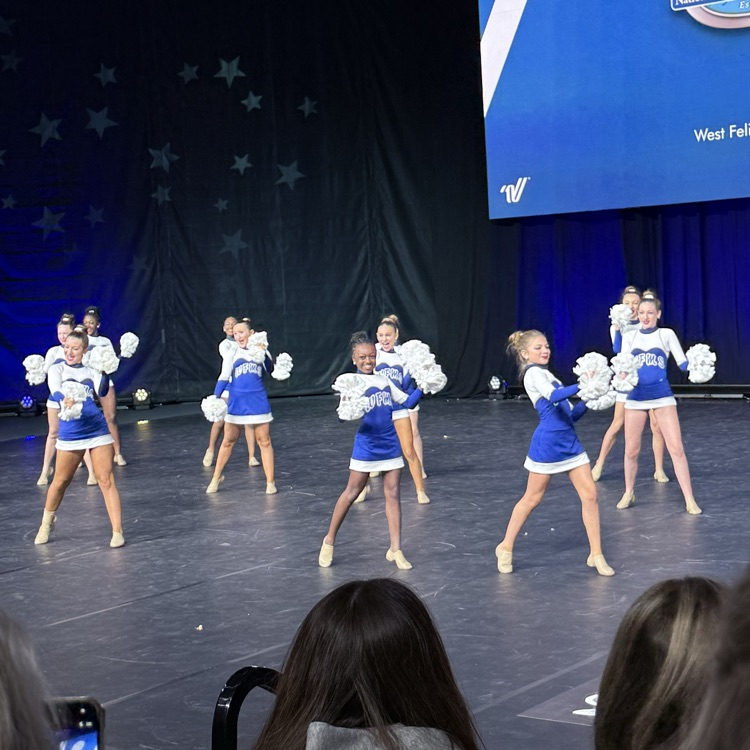 dance team performs on stage