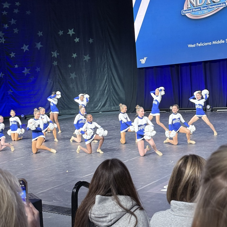 dance team performs on stage
