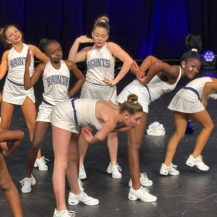 dance team performs on stage
