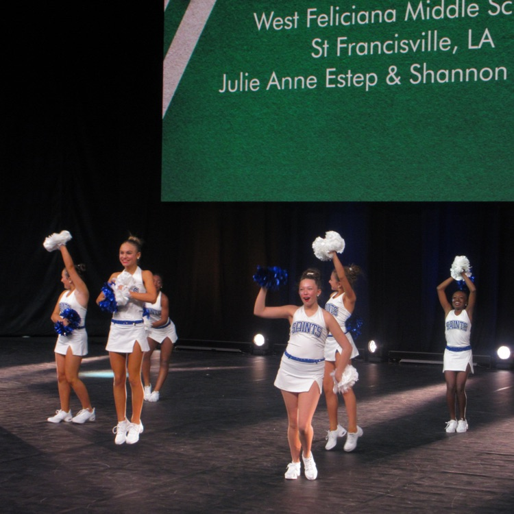dance team performs on stage