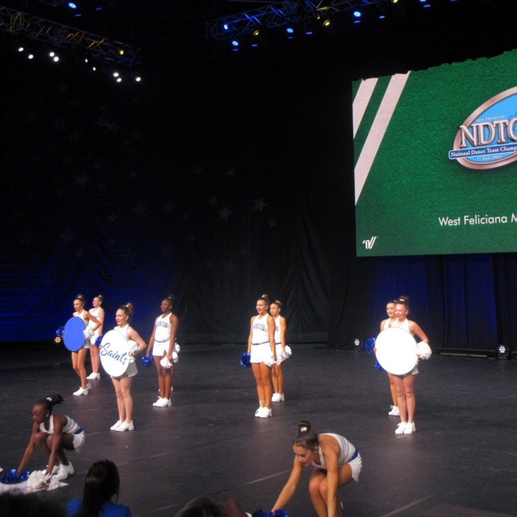 dance team performs on stage