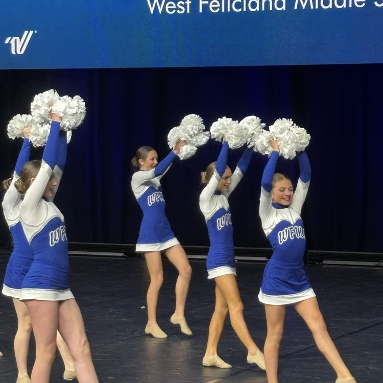dance team performs on stage