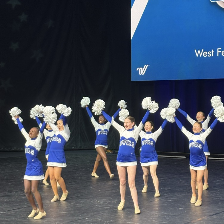 dance team performs on stage