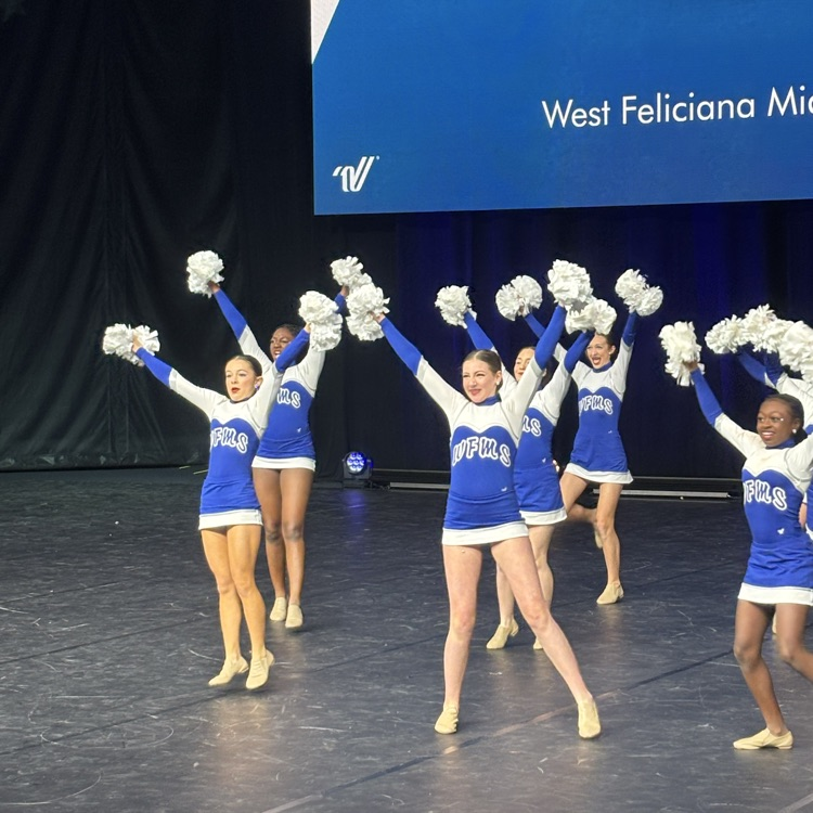 dance team performs on stage
