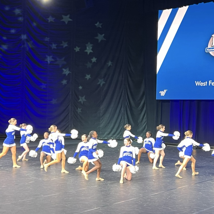 dance team performs on stage