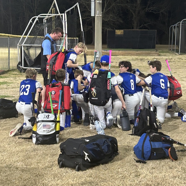 coach gives a pep dog before the game
