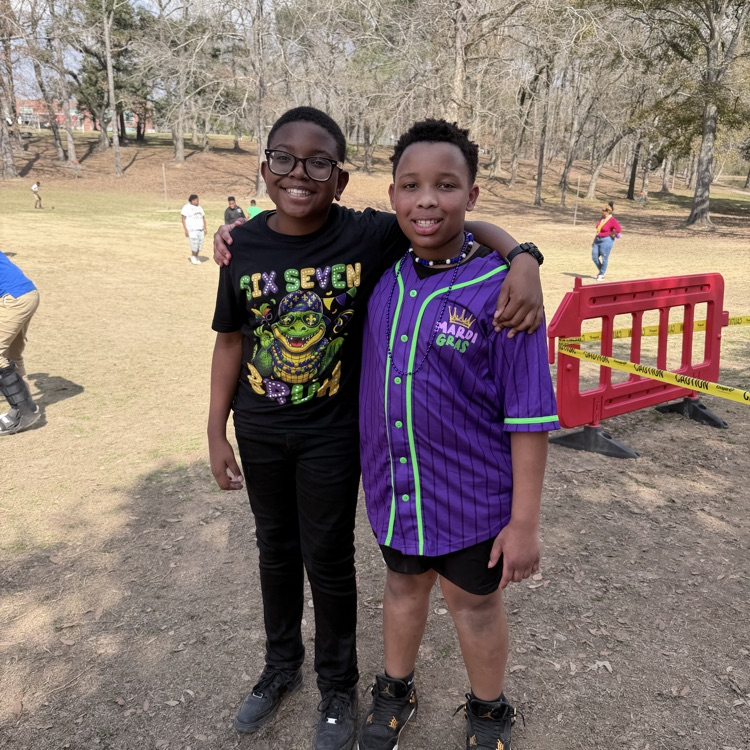 students dress for Mardi Gras. 