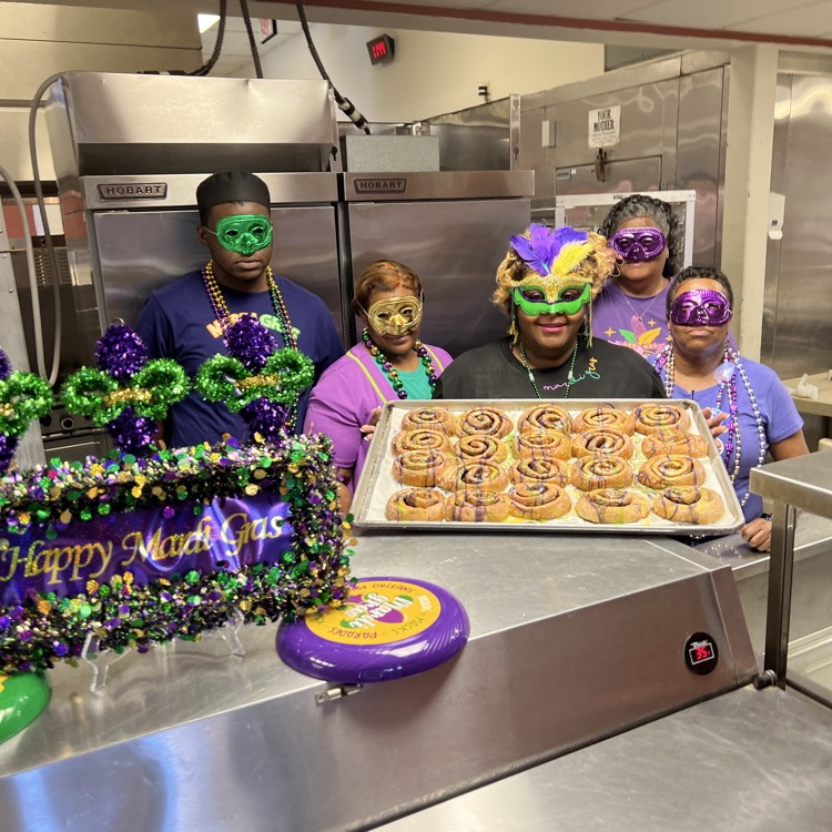 cafeteria staff shows of king cakes